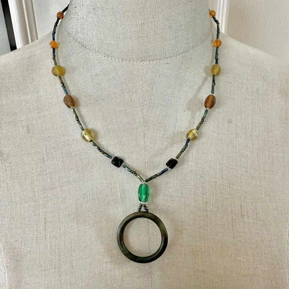 Green open circle beaded pendant necklace